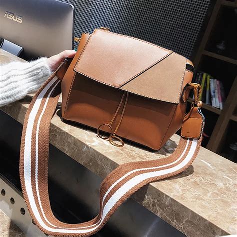 designer crossbody with thick strap